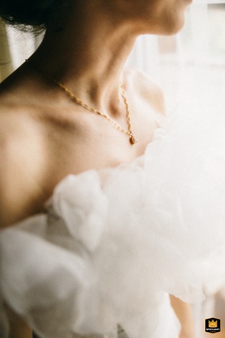 Warsaw Morning: A Polish Bride's Reflection Before the Wedding Ceremony Polish bride in her hotel room getting ready for the wedding in Warsaw.