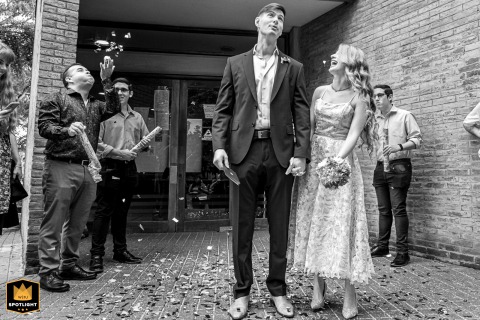 Joyous Argentinian Couple's First Steps as Newlyweds, Distrito Centro, Argentina Argentinian couple, glowing with joy, exit their civil ceremony at Distrito Centro, Argentina.