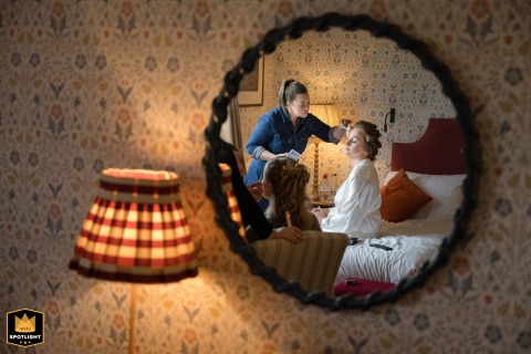 Bridal Reflection on a Floral Wall at Barnsdale Lodge Hotel Reflection of a bride at Barnsdale Lodge Hotel, with her makeup done, on a floral wallpapered wall.