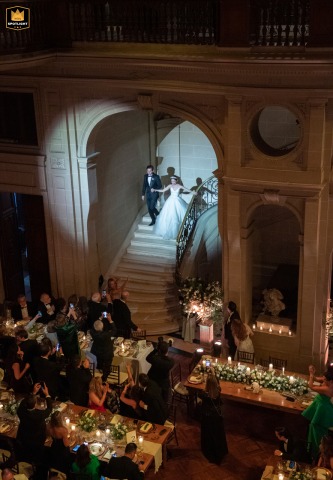 Buenos Aires Romance: A Regal Wedding Reception at Sans Souci Palace A wedding photographer captures a regal and glamorous shot of the bride and groom entering their reception at the Sans Souci Palace in Buenos Aires, Argentina.
