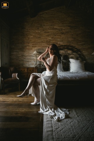 Elegant Bride Prepares In Domaine De Murtoli Room For Her Corsican Wedding Day Elegant bride in her preparation room at Domaine de Murtoli, Corsica, getting ready for her wedding day.