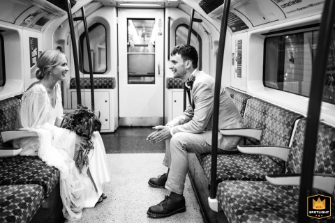 Newlyweds Share Peaceful First London Underground Ride In Empty Tube Car Together London Underground: a couple sits alone in a peaceful, empty tube car on their first ride as a married couple.