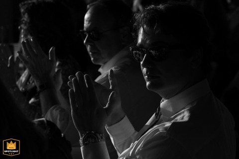 Guests applaud enthusiastically during a wedding ceremony held in a backyard in Decatur.