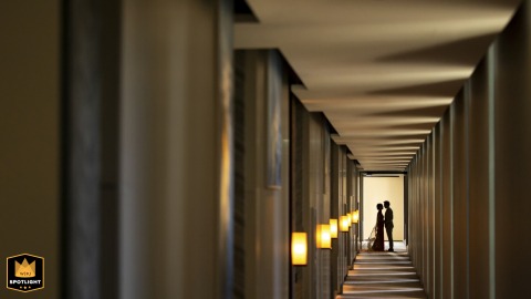 Bangkok Four Seasons: A Silhouette of Love in a Long Corridor Bangkok hotel wedding portrait: a silhouette of the couple in a long, repeating-patterned Four Seasons corridor.