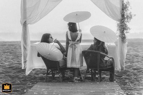 Reenacting The Wedding: Little Girls On A Portugal Beach After-ceremony fashion fun at Lavra Beach, Porto, Portugal: young girls playfully reenact the wedding.