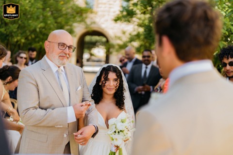 A Mares, Portugal Father Cries Giving Away His Daughter Amares, Portugal: The emotional father of the bride sheds tears as he gives away his daughter during the wedding ceremony.