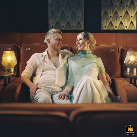 An Intimate Cinematic Moment for a St. Albans Wedding Wedding photo at The Hub on Verulam, St. Albans: Bride and Groom lovingly gaze at each other while seated in a cinema.
