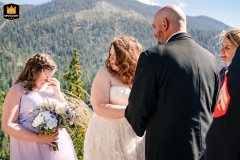 Little Emotion at the Altar: A Moment Before the Vows Bride and groom at Lake Tahoe, interrupted by their child's emotions before exchanging their wedding vows.