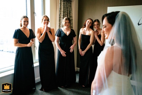 Philly's Finest: First Look at The Logan, Bridesmaids Admire The Bride At The Logan, Philadelphia, bridesmaids admire the bride's beauty as they see her in her dress for the first time.