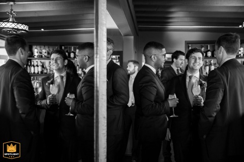 Groom And Friends Create Striking Mirror Image During Cocktail Hour At Heritage House Groom with friends during cocktail hour at Heritage House Resort and Spa, Mendocino, CA, creating a mirror image.