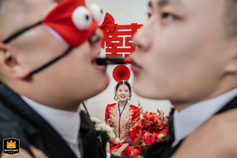 Groom and Groomsmen Playfully Apply Lipstick for Bride-Fetching Ritual in LanKao In Lankao, China, a wedding day tradition sees the groom and groomsmen playfully applying lipstick to one another as part of the ritual for fetching the bride.