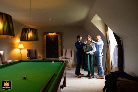 Groom's Opulent Style: Preparing for Wedding Day at Château de Labro Inside the opulent 16th-century Château de Labro in Onet-le-Château, the groom prepares for his wedding day, getting ready with undeniable style in the elegant surroundings.