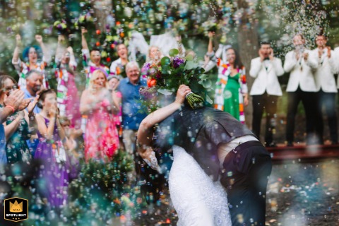 At Virginia's Stone Manor Boutique Inn, the bride and groom exit under a thick, joyous monsoon of bubbles released by guests, completely enveloping them in soapiness.