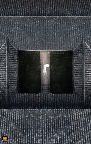 In Fujian, China, the bride lies on her back in her wedding dress for a solo portrait, captured from above by a drone, with traditional tiled rooftops surrounding her in a striking high-angle composition.