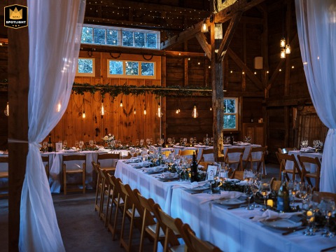   Before guests enter Beech Ridge Barn in Scarborough, Maine, quiet anticipation lingers in the beautifully decorated space, awaiting the start of the wedding celebration.