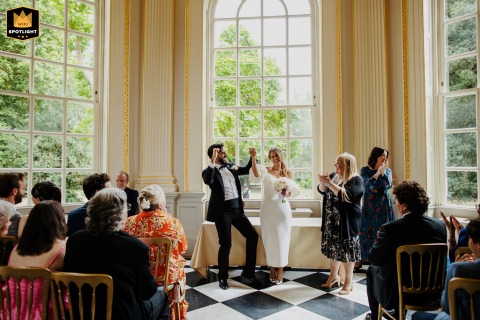   At Orleans House, newlyweds announced as a just-married couple, their excitement and happiness clear against the classic backdrop.