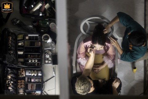   Preparations are underway in a suite at Mandarin Oriental Bangkok, as the bride readies for her wedding amidst the hotel’s luxurious setting.