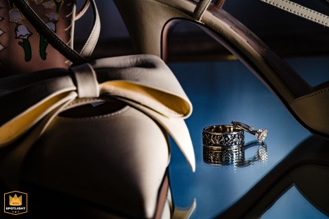   At Columbia Hotel in London, a detailed shot highlights the rings and brides shoes, a personal touch that enhances the couple’s unique celebration.