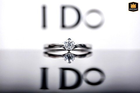   Creative close-up photography highlights the wedding rings in Kaifeng, China, artistically showcasing these meaningful symbols of love and commitment.