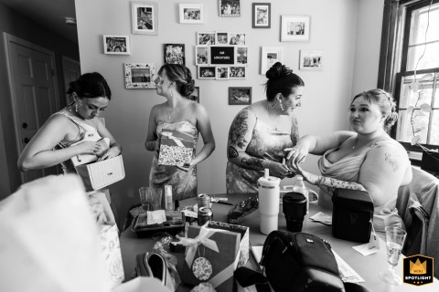 Inside a client’s home in Dennis, MA, friends and family gather around a crowded table, laughter and anticipation bubbling as everyone prepares for the big day together.