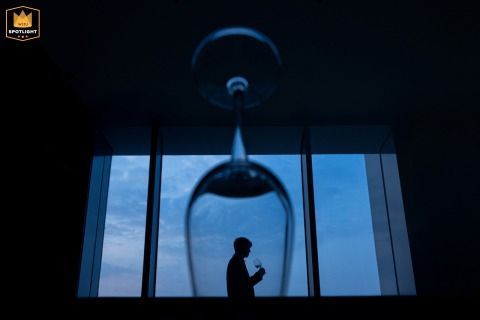 Inside a hotel in Taian, Shandong, the groom poses for a portrait as he prepares for the wedding festivities.