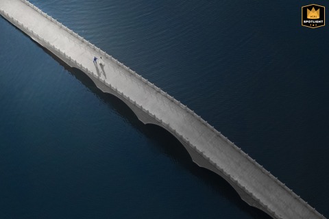 A couple portrait set outside in Taian, Shandong, shows the newlyweds standing together, united in love and anticipation for their future.