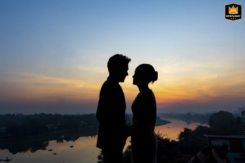This couple portrait at Neera Retreat Hotel in Thailand features the newlyweds standing close, beautifully composed against the tropical and stylish backdrop of the venue.