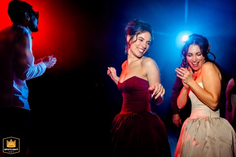 Joyful Wedding Guests Fill The Dance Floor At Salle Des Fêtes De Campsas In France On the dance floor at the Salle des Fêtes de Campsas, joyful wedding guests fill the night with laughter and celebration, making memories during the evening festivities.