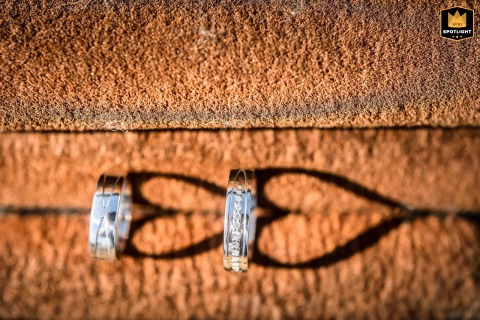 Wedding Rings Are Artfully Captured Among Dramatic Shadows For A Sophisticated Still Life In France Beautiful wedding rings are artfully captured among dramatic shadows, creating a sophisticated and artistic still life image during a wedding celebration held in the town of Salagnon, France.