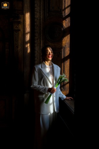 Beautiful natural light illuminates the bride in Zug, Switzerland, creating a serene and ethereal atmosphere.