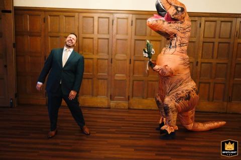 A groom is playfully fooled during a humorous first look moment outside the historic Old South Church in Boston, Massachusetts, as he prepares to see his beautiful bride.