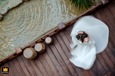 In Aix-en-Provence, the bride spins in motion, her dress and expression animated by the movement as the scene feels light, joyful, and full of energy.