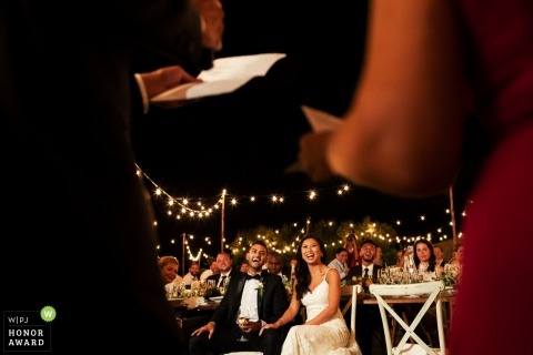  Florence wedding shoot with a couple laughing during the wedding speeches