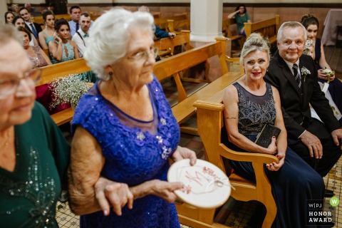 Wedding image from the Parish Church of Feliz, RS as Mother of the Bride is Thrilled to see her mother entering with the rings