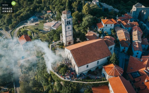 Drone wedding photo from Kvarner, Croatia as the Best men's head football torches to make a spectacular scene, but Instead they almost burn down the whole village