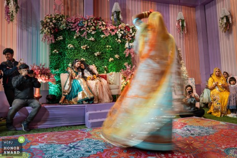 In Jodhpur, India, the bride performs a dance at the reception venue.
