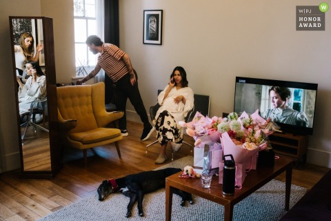 Wedding Party Prepares for Ceremony Amid Elegant Details at Town Hall Hotel in London Preparations unfold at Town Hall Hotel as anticipation builds for the ceremony, with wedding party members busy getting ready in the venue’s elegant setting.