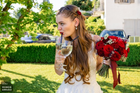 Guests gather at Hotel Seeburg in Lucerne, Switzerland, to enjoy a selection of refreshing cocktails and drinks during a lively outdoor reception overlooking the scenic Swiss landscape.