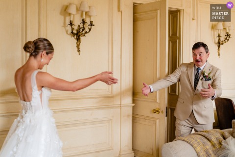 Bride’s Dad Reacts Emotionally To Seeing Her In Dress At Cliff At Lyons Ireland Wedding At Cliff at Lyons, Ireland, the photographer captures the bride’s dad reacting emotionally to seeing her in her dress, expertly preserving a touching, unforgettable pre-ceremony moment.