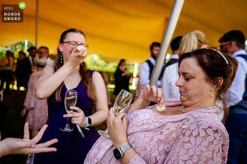 The guests to enjoy food and drink at Ridge Farm in Lancashire, highlighting the generous hospitality and celebration of the day. 