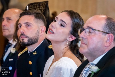 Jaén, Spain: Silent Tear Falls at Wedding in Ermita Virgen de Linarejos Church Jaén, Spain: A silent tear falls at Ermita Virgen de Linarejos.