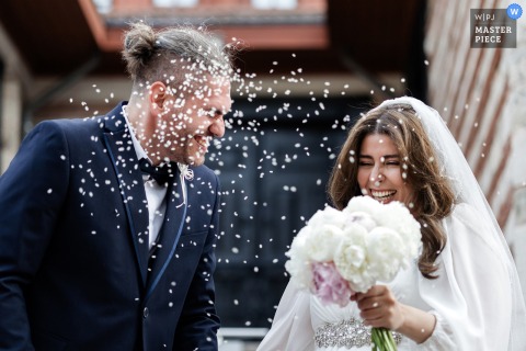 St. George’s Cathedral Wedding: Joyful Couple Showered with Rice in WPJA-Winning Moment A WPJA-winning image at St. George's Cathedral, Istanbul, captures rice showering over a joyous bride and groom, highlighting the photographer’s dynamic composition and perfect timing to immortalize celebratory moments.