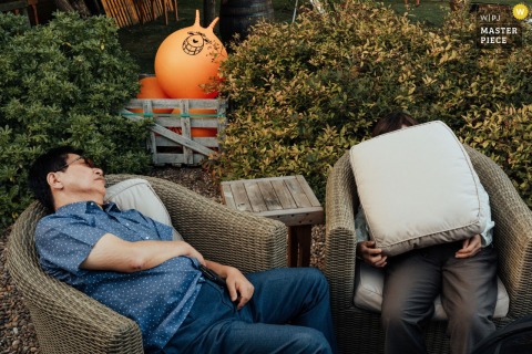 At Pheasantry Brewery in Nottinghamshire, UK, a few wedding guests are caught napping at their tables, adding a lighthearted and candid touch to the celebration.