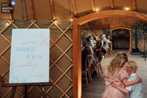 At Thorpe Garden in Staffordshire, UK, an older sister gently comforts her younger brother before the wedding ceremony.