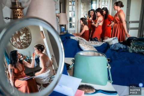At Chateau du Prada in Saint-Lon-les-Mines, France, the bride gets ready for her wedding during the preparation phase, surrounded by anticipation and excitement.