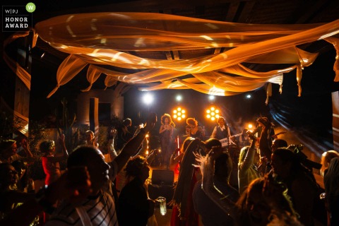 SuperPop, the wedding band, delivers a lively performance at the Odera Hotel in Tinos, Greece, filling the celebration with music and entertainment.