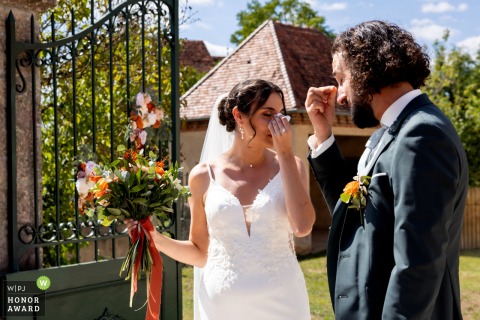 In Bière les Semur, emotions run high as the bride and groom shed tears together in a quiet moment before their upcoming ceremony.