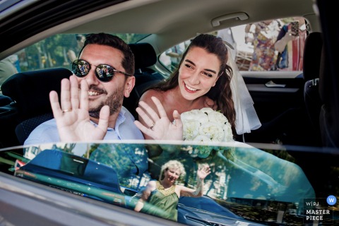 In Atakoy, Istanbul, Turkiye, the couple sets off from the bride’s home in the back of a car, marking the official start of their wedding day. The scene reflects anticipation, excitement, and the beginning of their celebration together.