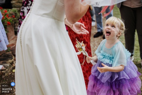 A Joyful Introduction Unfolds In Hertfordshire As The Bride Shares A Heartwarming First Meeting With Her Niece. At her parents’ house in Hertfordshire, the bride smiles as she greets her niece for the first time, sharing a heartwarming meeting with family.