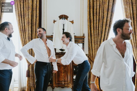 Camaraderie And Laughter Abound Inside The Men’s Room At Pera Palace, Istanbul, Capturing Unscripted Friendship Moments. Inside the men’s room at pera palace, camaraderie and lighthearted moments unfold among friends, capturing a slice of behind-the-scenes fun in Istanbul.
